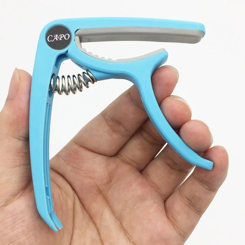 Capodastre de guitare en plast - Guitar Tuner Clip avis et prix